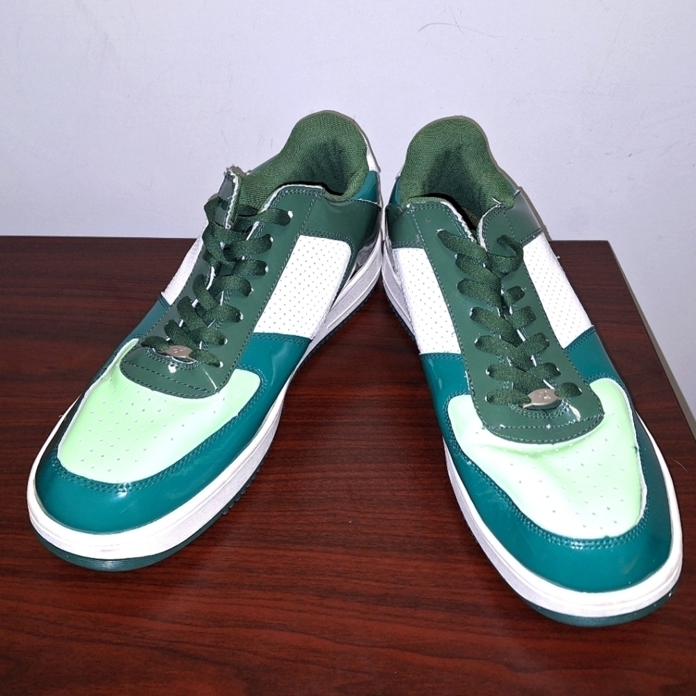A pair of Starbury men's size 14 green sneakers. They're in excellent condition
